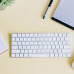 a photo of a desk with a notepad